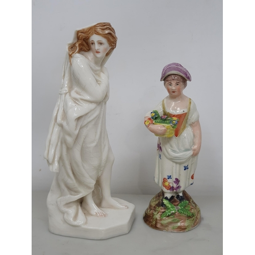 500 - A ceramic figurine of a lady in a Belleek style glaze on plinth base, 6 1/2in H, a Staffordshire fig... 