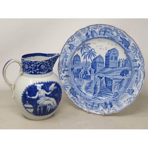 510 - A large blue and white 'Leeds Pottery' Charger with floral and scrolled rim, the centre decorated wi... 