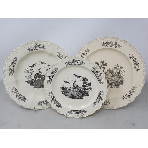 512 - A creamware Plate of oval form with pierced basket weave rim, the centre decorated with peafowl in l... 