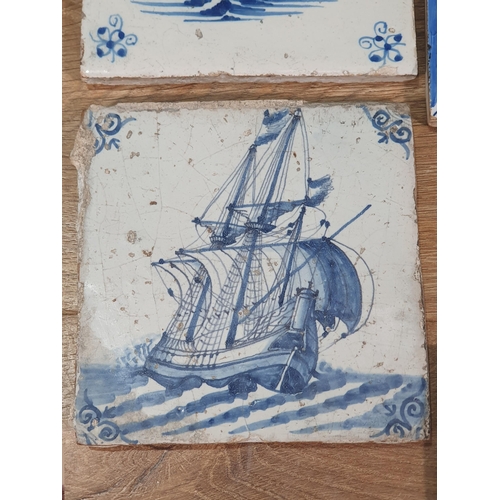 520 - A collection of Delft and other tiles including two floral decorated Dutch tiles, a set of six blue ... 