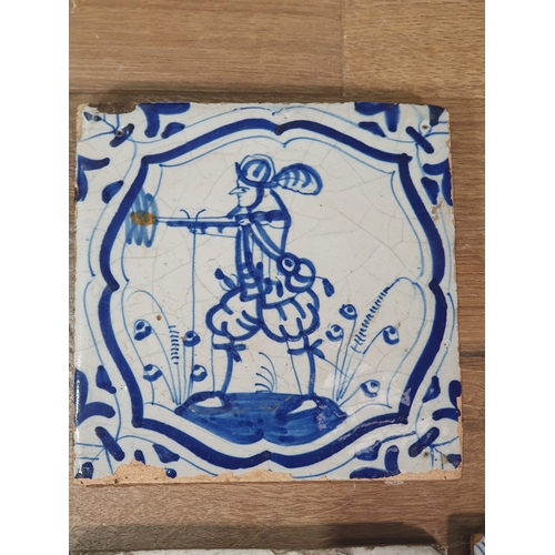 520 - A collection of Delft and other tiles including two floral decorated Dutch tiles, a set of six blue ... 