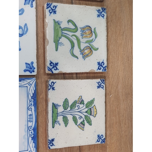 520 - A collection of Delft and other tiles including two floral decorated Dutch tiles, a set of six blue ... 