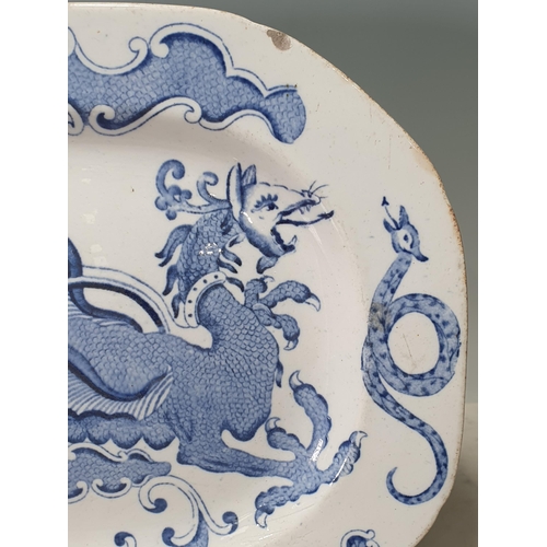 521 - An English pearlware Platter with floral and lattice decorated rim with central scene depicting pago... 