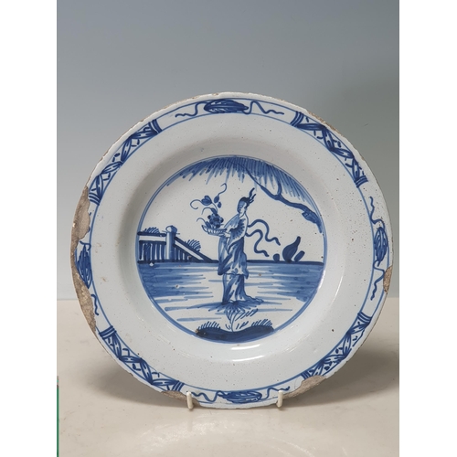 521 - An English pearlware Platter with floral and lattice decorated rim with central scene depicting pago... 