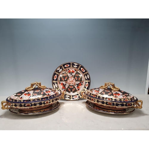 530 - A 19th Century Davenport part service decorated in Imari colours and profusely gilt, and with elabor... 