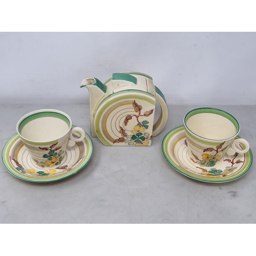 532 - A Clarice Cliff Tea-for-Two Tea Service, Stanford Shape, and decorated green hydrangea pattern, incl... 