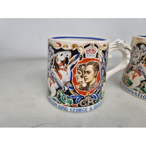 543 - Four Coronation Mugs for the Coronation of King George VI and Queen Elizabeth designed by Dame Laura... 