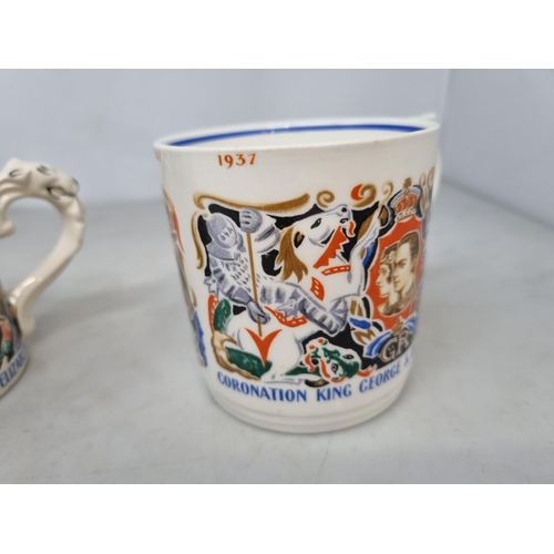 543 - Four Coronation Mugs for the Coronation of King George VI and Queen Elizabeth designed by Dame Laura... 