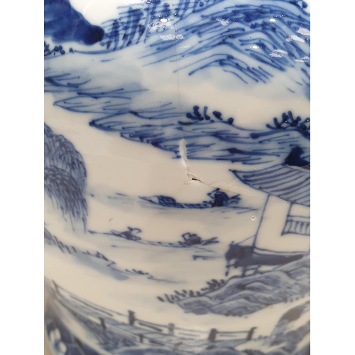 557 - A pair of Chinese blue and white Jars and Covers of baluster form with design of figures and animals... 