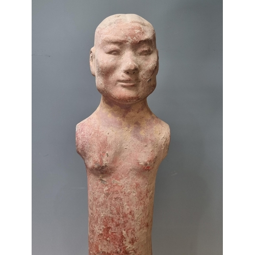 597 - A Chinese clay/terracotta Standing Figure of a Man (possibly Han Dynasty), with wooden bracket suppo... 