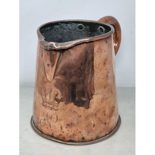 615 - An antique copper Beer Muller with handle, 10in L, and an antique Beer Jug with engraved crest, 9in ... 