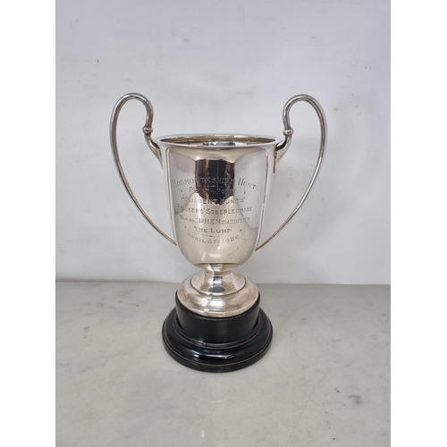 63 - A George V silver two handled Racing Trophy with presentation inscription, Chester 1911, 680gms, on ... 