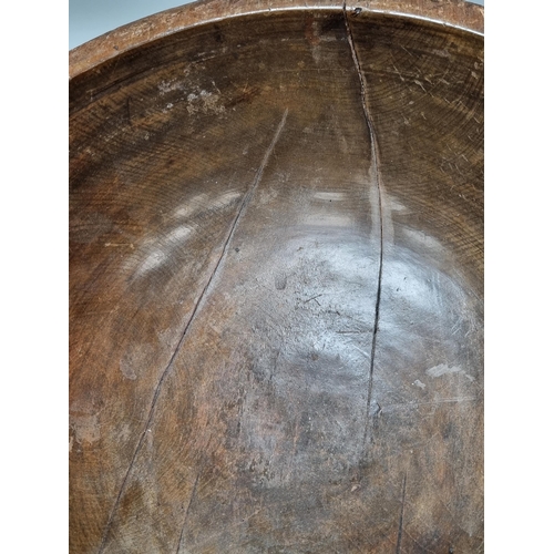 651 - An antique treen Bowl (split through centre) 1ft 4in D