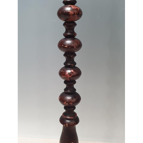 654 - A 19th Century turned wooden Wig Stand on tri-form platform base with painted finish 1ft 10in H