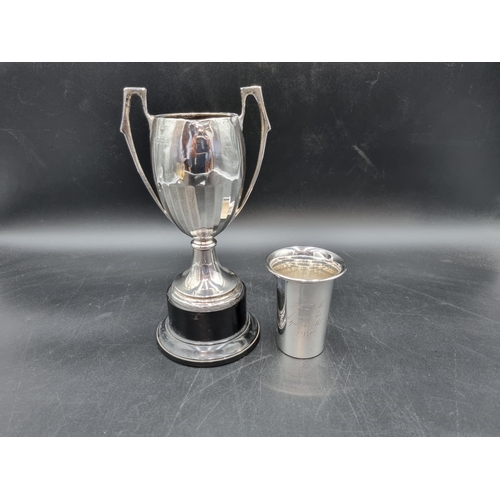 68 - A George V silver two handled Trophy of panelled form, Birmingham 1928, 180gms, on ebonised plinth, ... 