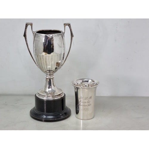 68 - A George V silver two handled Trophy of panelled form, Birmingham 1928, 180gms, on ebonised plinth, ... 