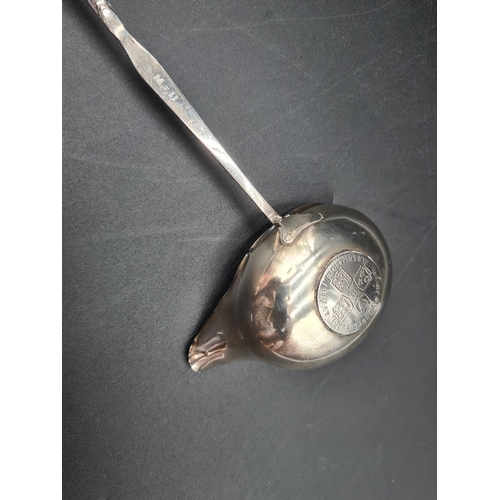 72 - A Georgian Toddy Ladle with coin inset oval bowl, spiral whalebone handle