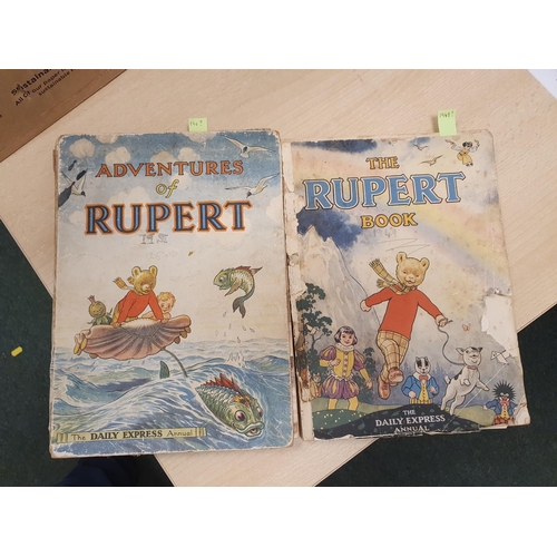 729 - Twenty-three copies of Rupert Annuals, 1940's-2014, some wear and rubbing to bindings; (23)