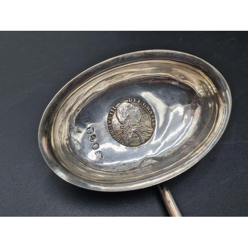 73 - A George III Toddy Ladle with coin inset oval bowl, spiral whalebone handle, London 1802