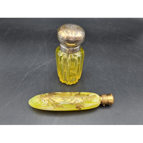 78 - An Edward VII silver lidded yellow glass Scent Bottle engraved initials, Chester 1908, and an opalin... 