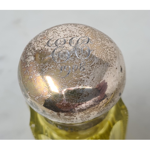 78 - An Edward VII silver lidded yellow glass Scent Bottle engraved initials, Chester 1908, and an opalin... 