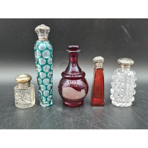 81 - A blue overlaid glass Scent Bottle with embossed lid, A/F and four other Scent Bottles in red and cl... 