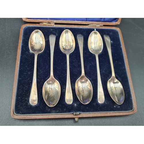 85 - Six George V silver Teaspoons, Sheffield 1928, and three long handled Spoons, Sheffield 1936, both c... 