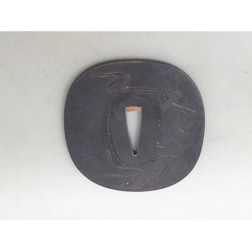 853 - A Japanese Edo Period iron Sword Tsuba with engraved decoration of goose 3in W