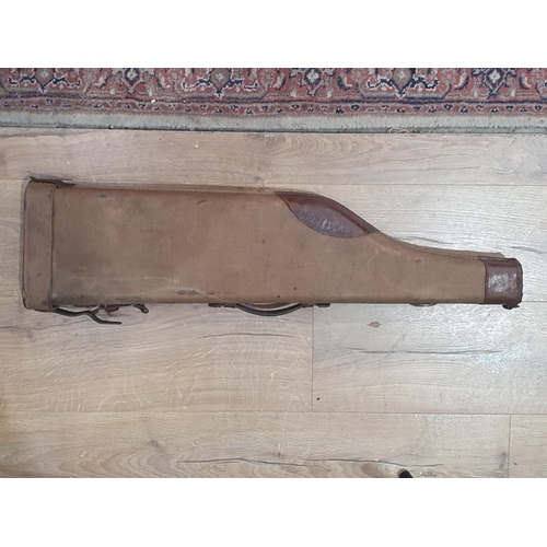 856 - A vintage canvas covered Leg of Mutton Gun Case with American Military Badge 2ft 6in L