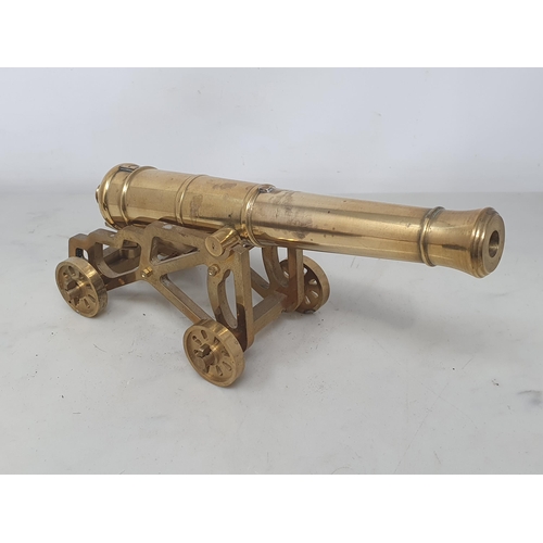 857 - Three turned brass model Desk Canons