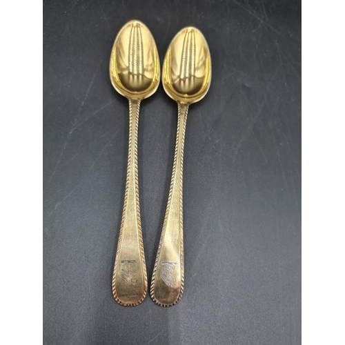 90 - A matched Set of silver-gilt Cutlery engraved bird crests, viz: 12 Table Spoons Onslow pattern, Lond... 