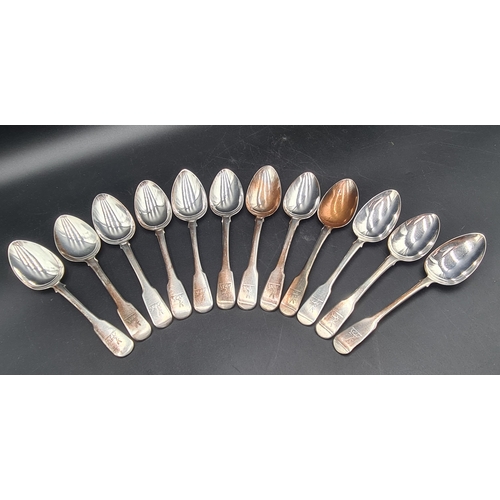 99 - An early 19th Century silver part Set of Cutlery fiddle pattern engraved deer crests, viz: 4 Table S... 