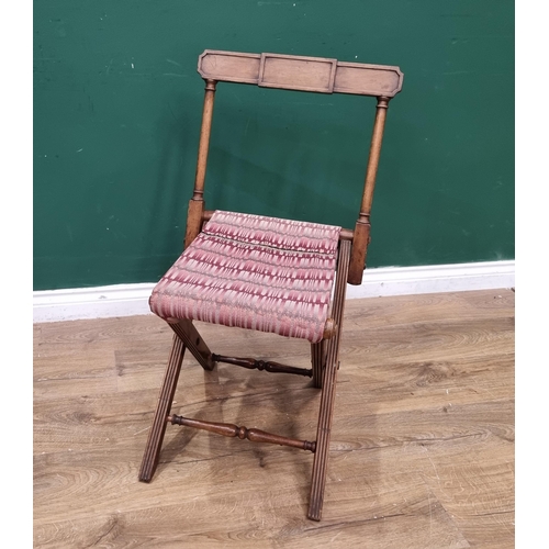 260 - A small Regency folding Campaign Chair with reeded detail