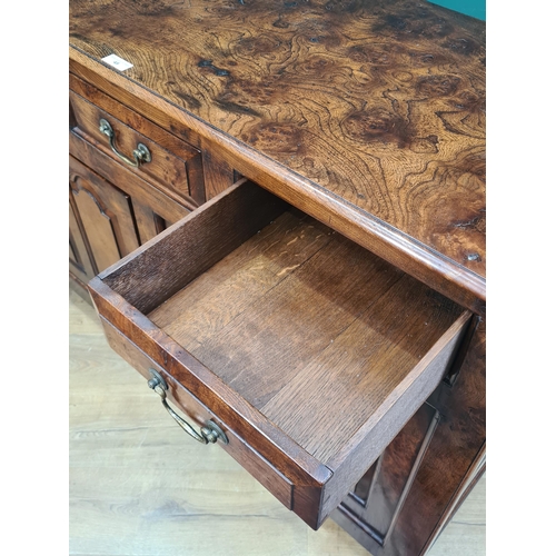 417 - A good quality reproduction burr-elm Dresser Base, fitted three moulded drawers above a pair of cupb... 