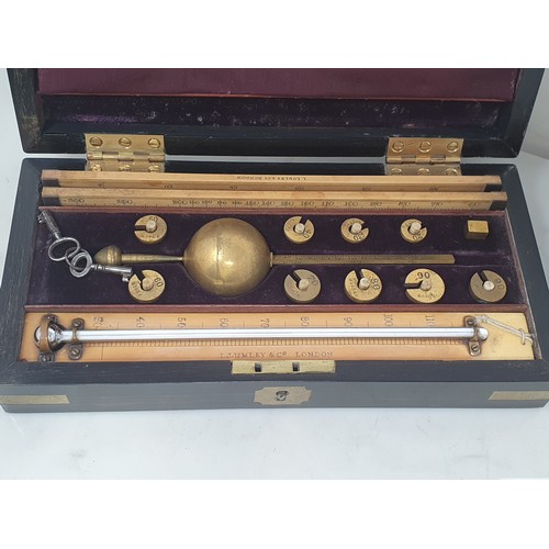 635 - A 19th Century Sikes' Hydrometer by Lumley & Co. in brass bound coromandel case with contents in fit... 