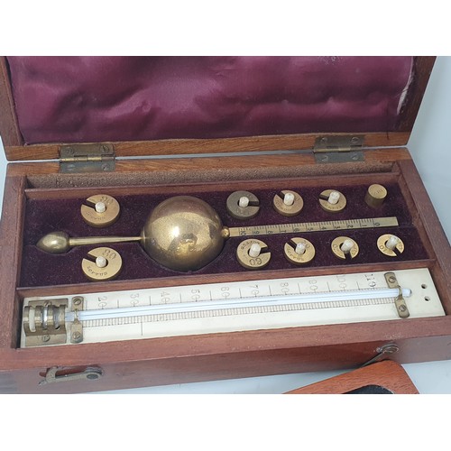 636 - A 19th Century Sikes' Hydrometer in mahogany and bone strung fitted case 8in x 4 1/4in, a Dring & Fa... 