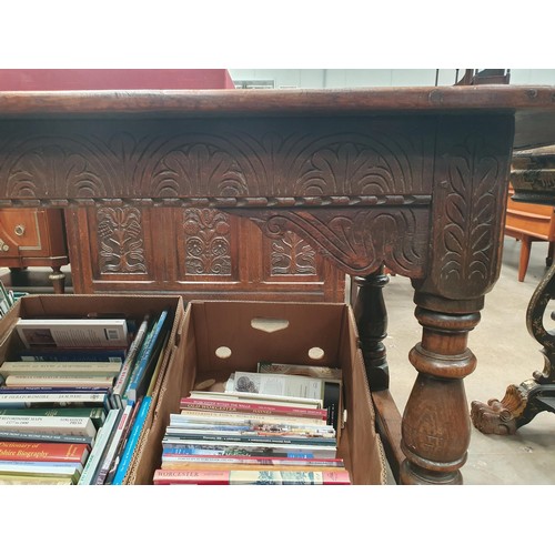 382 - A 17th Century oak Refectory Table with cleated three plank top above leafage arcade carved frieze r... 