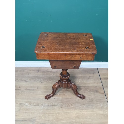 258 - A Victorian burr walnut Sewing Table with marquetry inlaid top, fitted interior on turned and carved... 