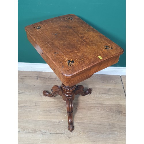 258 - A Victorian burr walnut Sewing Table with marquetry inlaid top, fitted interior on turned and carved... 