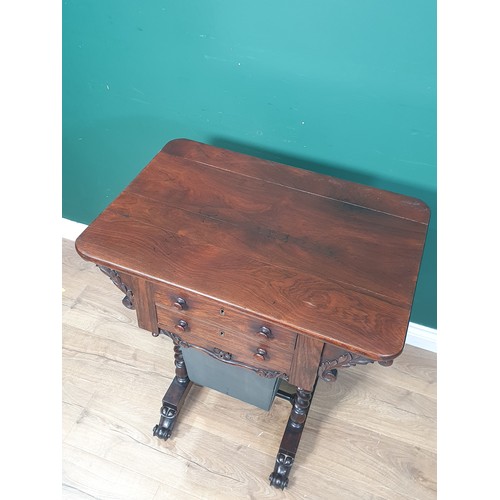 259 - A 19th Century rosewood Work/Sewing Table, the two drawers fitted with compartments, above a pull-ou... 