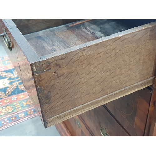 369 - An 18th Century oyster walnut and boxwood string inlaid Chest of Drawers, the moulded and cross band... 