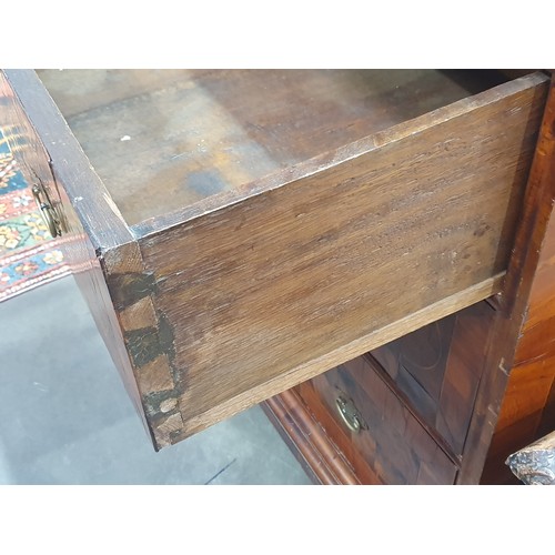 369 - An 18th Century oyster walnut and boxwood string inlaid Chest of Drawers, the moulded and cross band... 