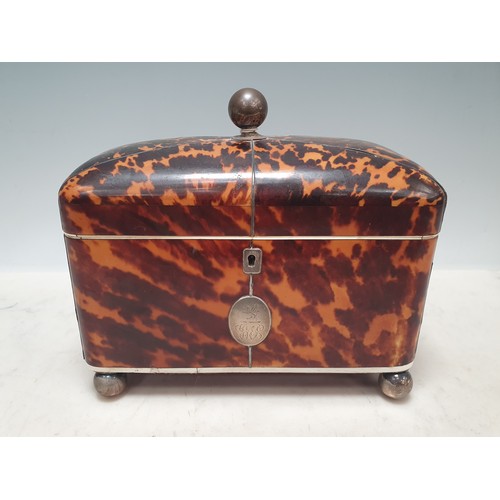 431 - A 19th Century tortoiseshell Tea Caddy with two interior lidded compartments, silver cartouche engra... 