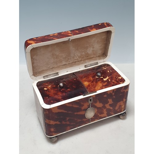 431 - A 19th Century tortoiseshell Tea Caddy with two interior lidded compartments, silver cartouche engra... 