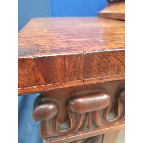 289 - A 19th Century rosewood Display Cabinet with carved frieze above a single glazed door enclosing thre... 