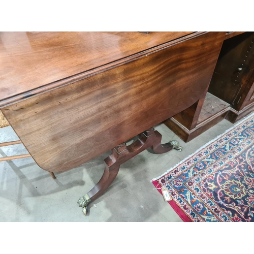 364 - A Regency mahogany Sofa Table in the manner of Gillows fitted two frieze drawers on twin turned colu... 