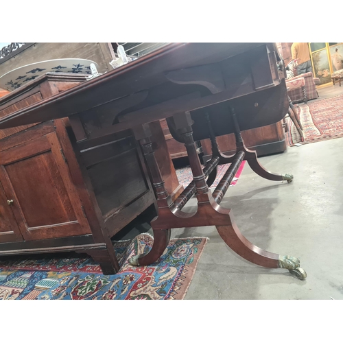 364 - A Regency mahogany Sofa Table in the manner of Gillows fitted two frieze drawers on twin turned colu... 