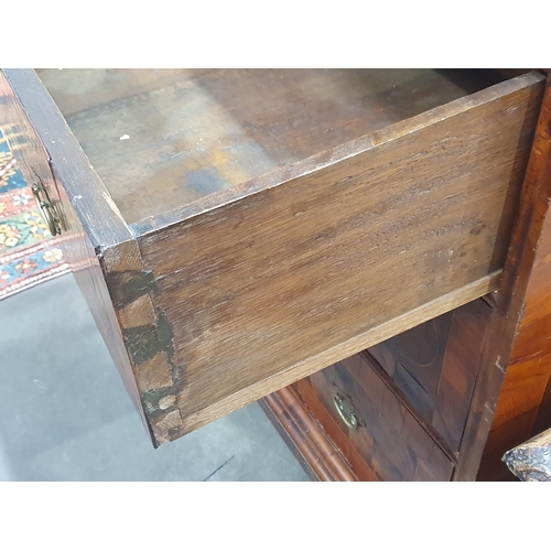 369 - An 18th Century oyster walnut and boxwood string inlaid Chest of Drawers, the moulded and cross band... 