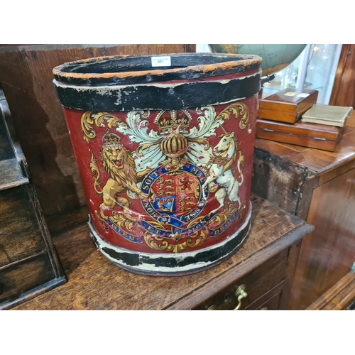 407 - An antique Drum with painted Armorial design converted to a waste paper bin 1ft 3in H x 1ft 3in D