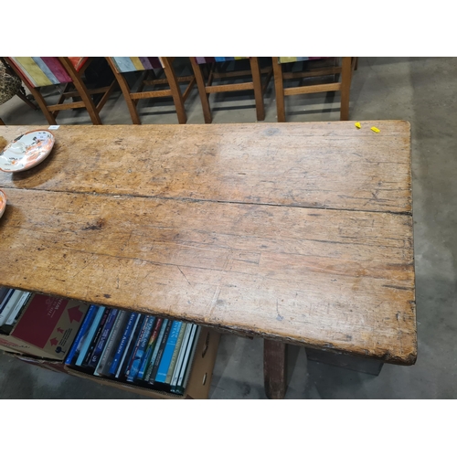 412 - An early 19th Century pine Tavern Table with two-plank top on cross-frame with squared stretcher, 8f... 